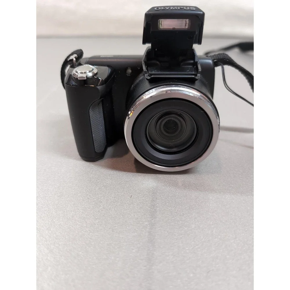Olympus SP-610UZ 14MP Digital Camera 22x Optical Zoom Black Bundle HD Video